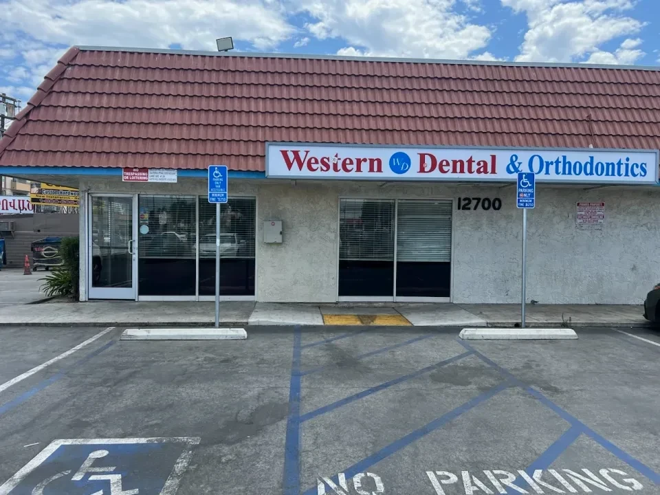 Before: the dental office storefront's original photo